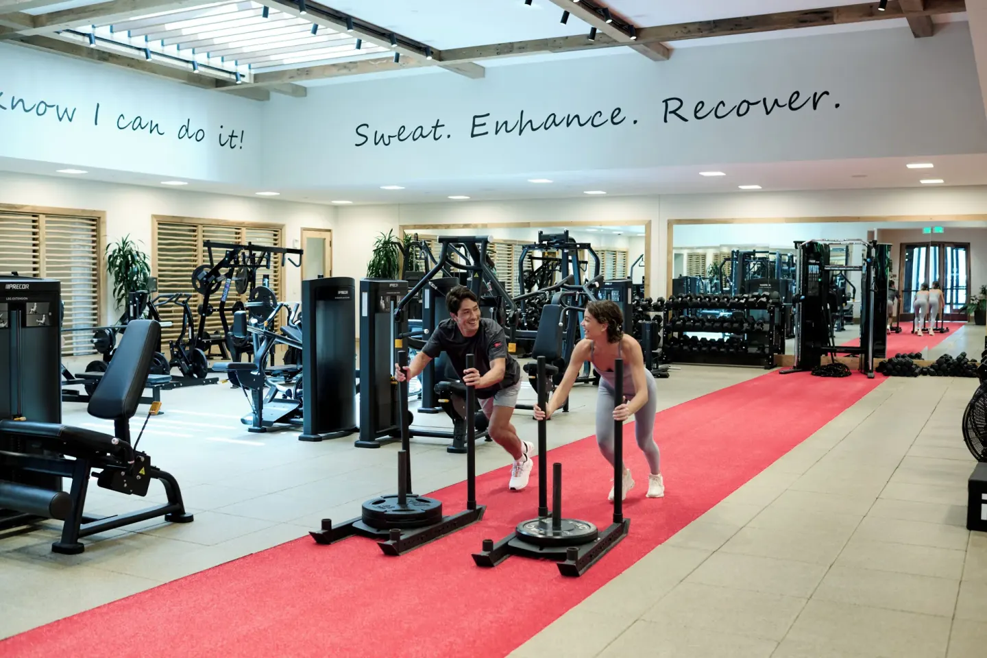 Fitness center with sled equipment and strength machines at 1 Hotel Hanalei Bay.