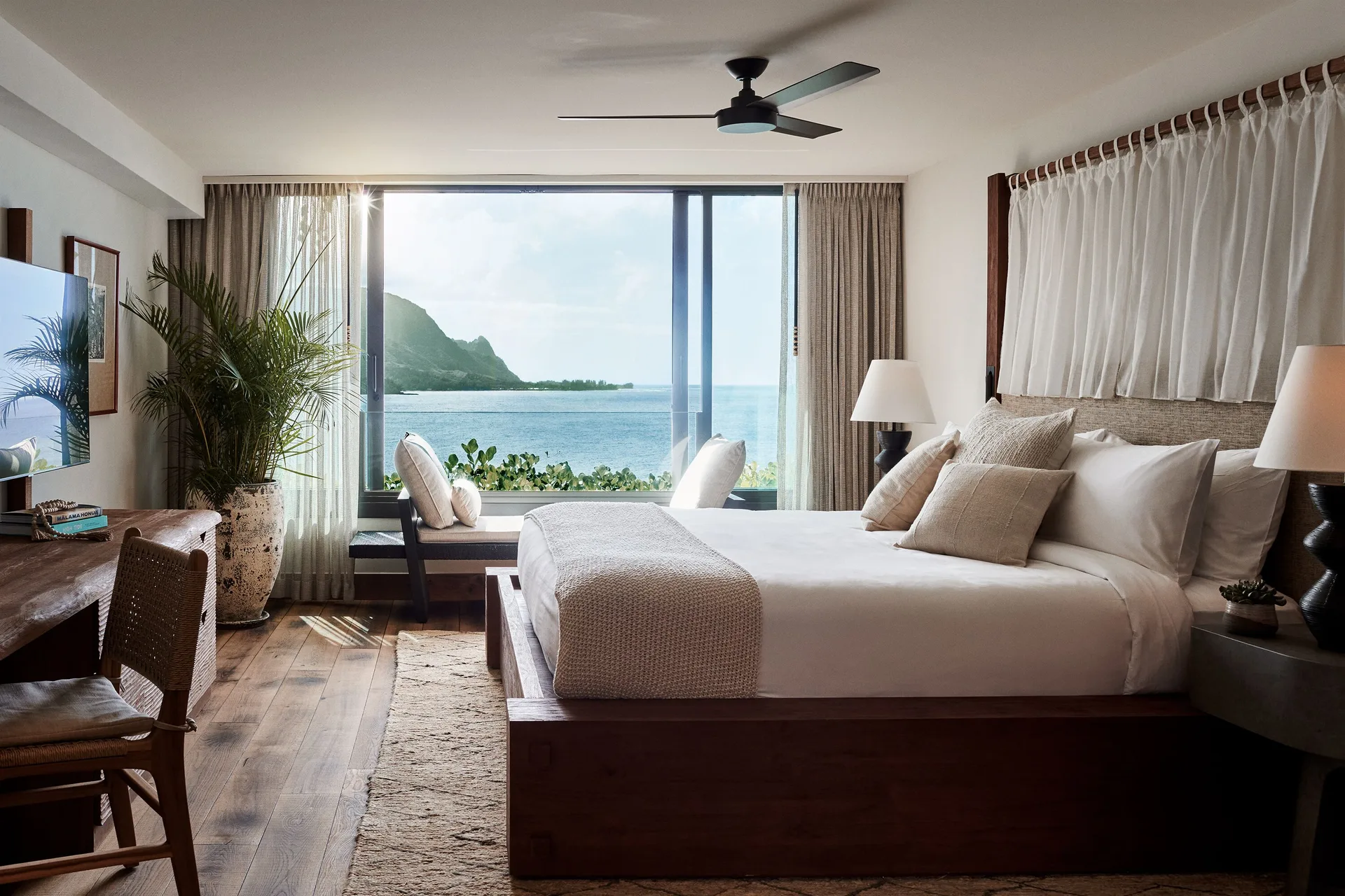 Makana Penthouse bedroom with ocean and mountain view at 1 Hotel Hanalei Bay.