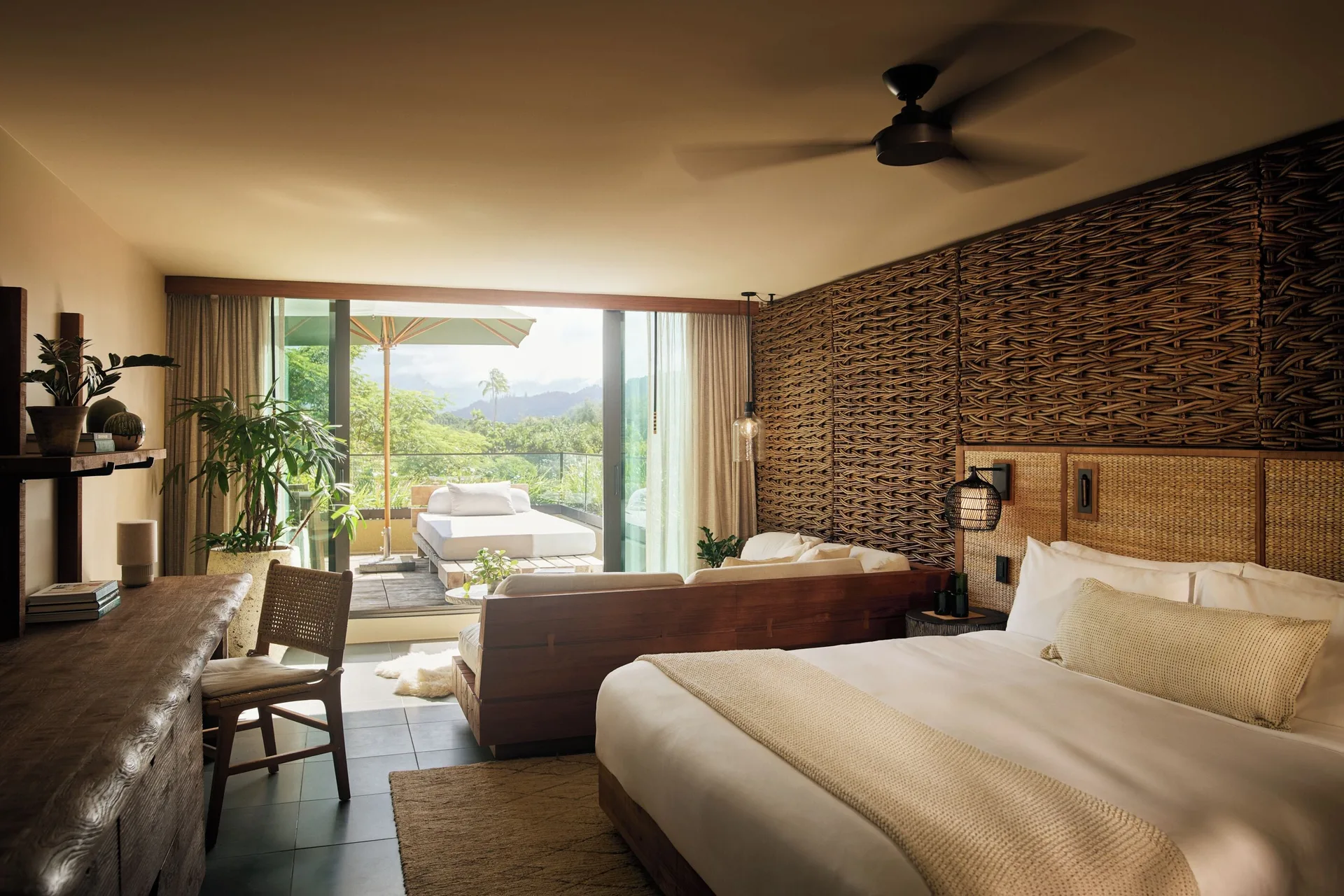 Mountain View Terrace guest room with king bed and open lanai at 1 Hotel Hanalei Bay.
