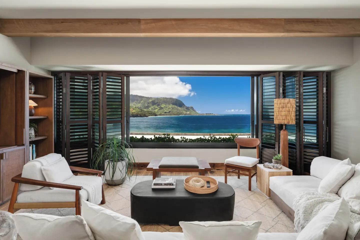 Nāpali House Suite living room with bay and mountain views at 1 Hotel Hanalei Bay.