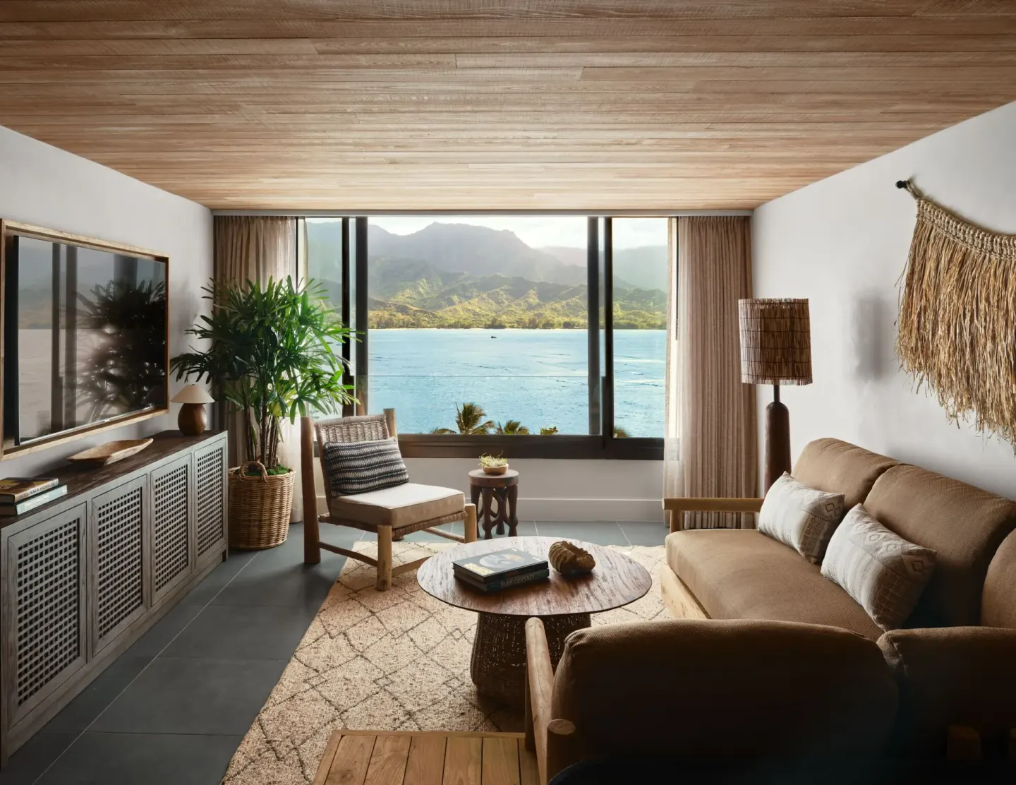 Ocean View 1 Bedroom Suite living room with bay and mountain views at 1 Hotel Hanalei Bay.