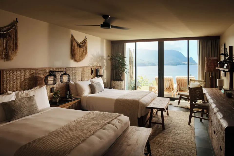 Ocean View Terrace room with two queen beds and balcony at 1 Hotel Hanalei Bay.