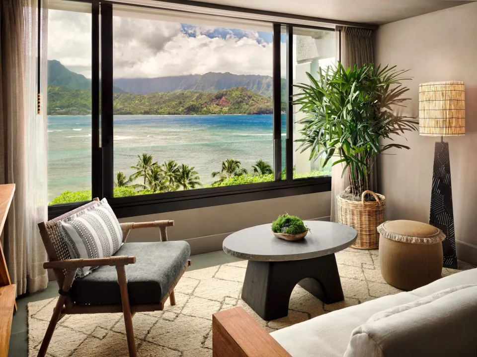 Ocean View room seating area with bay and mountain views at 1 Hotel Hanalei Bay.