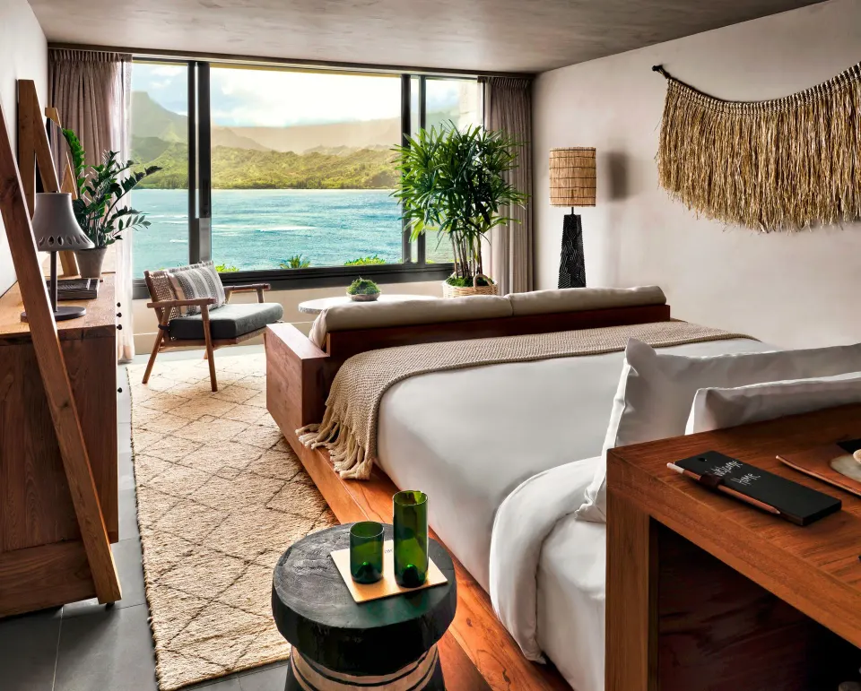 Panoramic Ocean View king bed room with bay and mountain views at 1 Hotel Hanalei Bay.