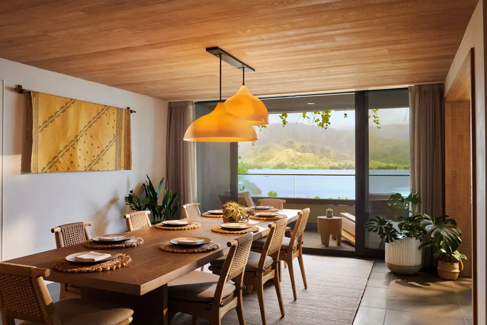 Pu'u Poa Ocean Loft Suite dining area with ocean-view windows at 1 Hotel Hanalei Bay.
