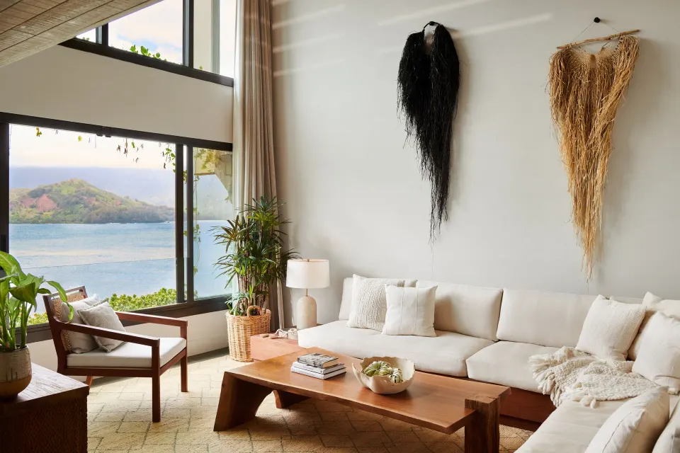 Pu'u Poa Ocean Loft Suite living room with ocean and mountain views at 1 Hotel Hanalei Bay.