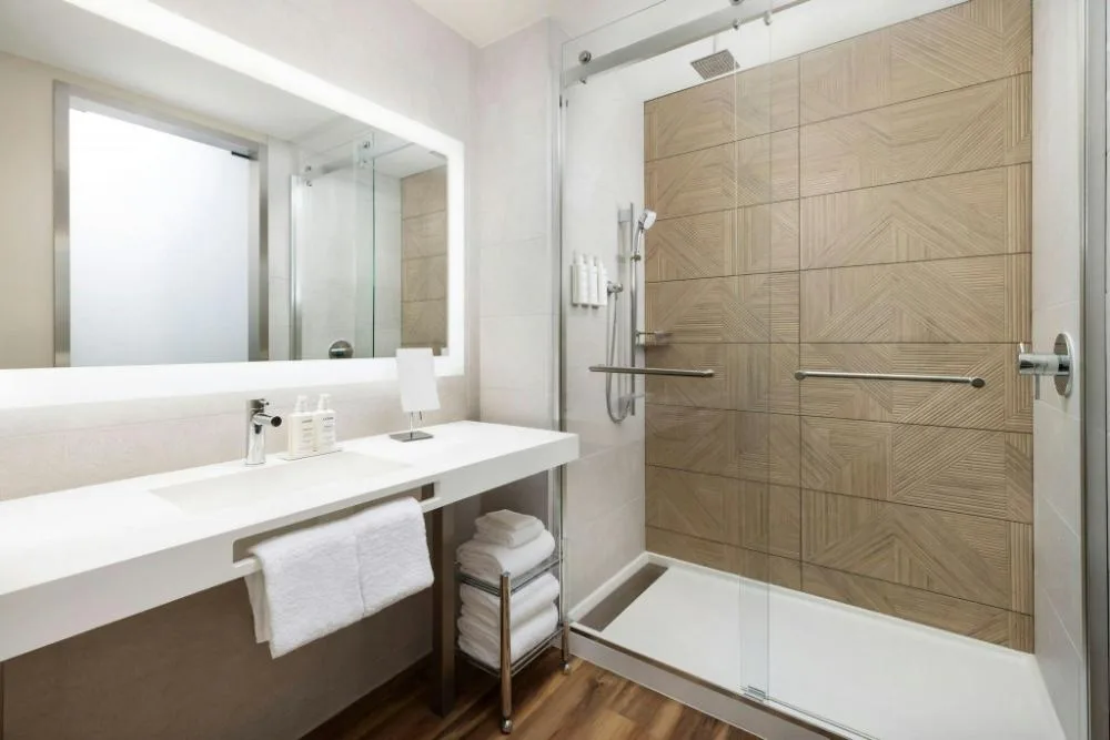 City View Mobility Accessible with Roll-In Shower at AC Hotel Honolulu featuring ADA-compliant design and downtown city views.