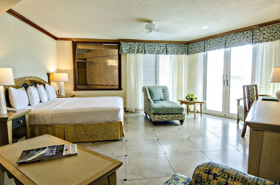 Island View Standard Room with king bed and seating at Accra Beach Hotel & Spa.