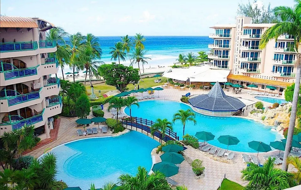 Ocean view over pools, palms, and beach at Accra Beach Hotel & Spa.