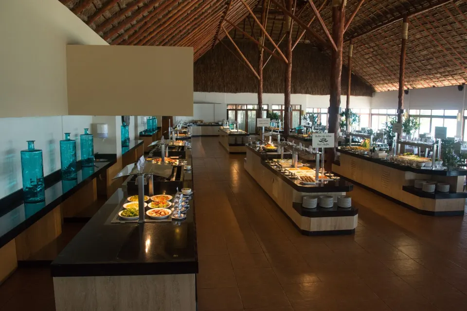 Spacious buffet station with food islands inside Akumal Bay Beach & Wellness Resort at Akumal Bay Beach & Wellness Resort