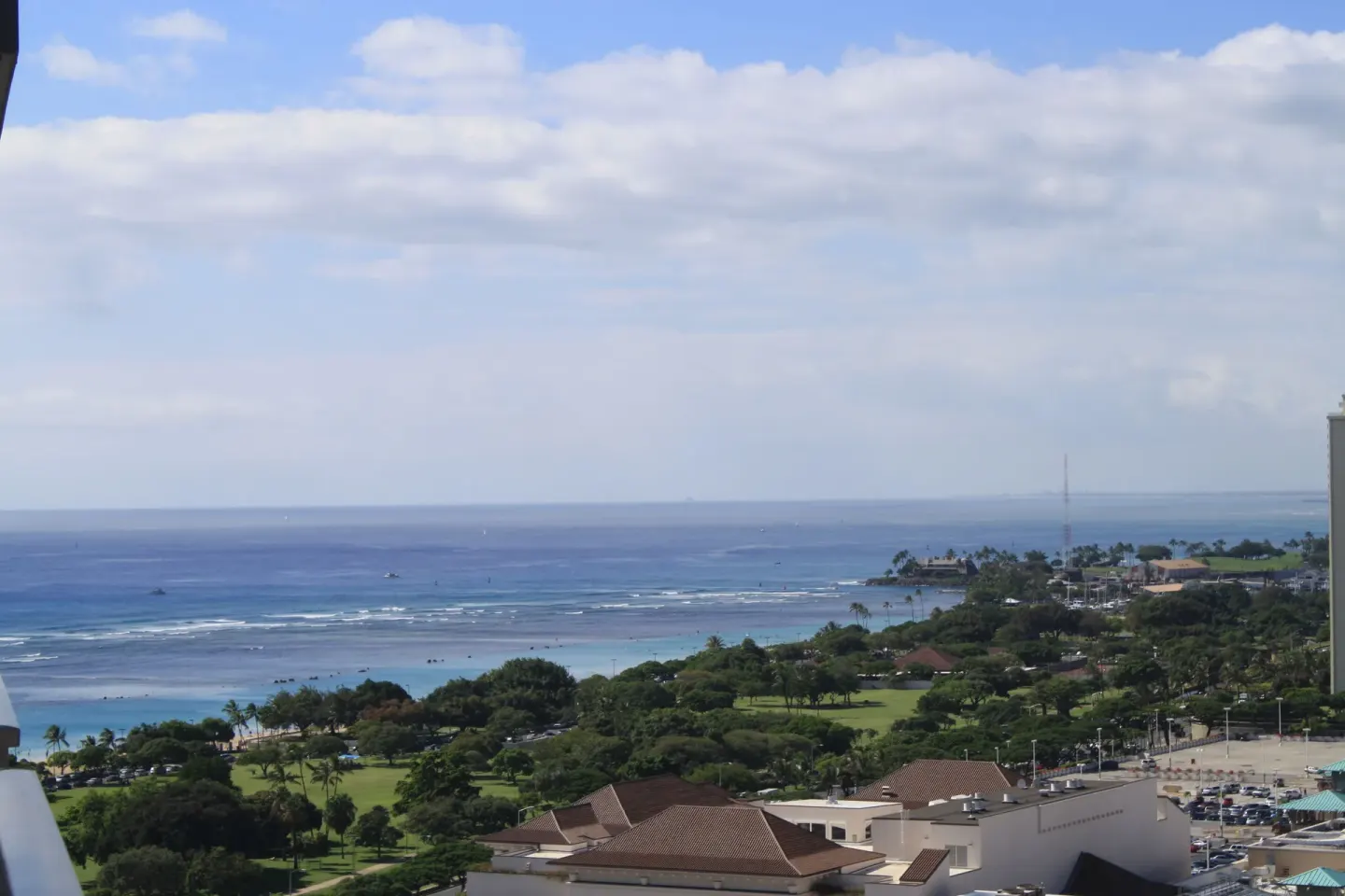 Ocean and park views from Ala Moana Hotel with reef waves and shoreline greenery.