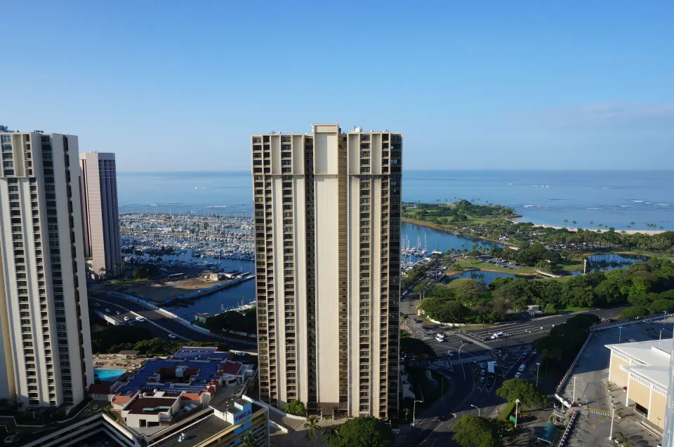High-rise towers, marina, park, and ocean view from Ala Moana Hotel.