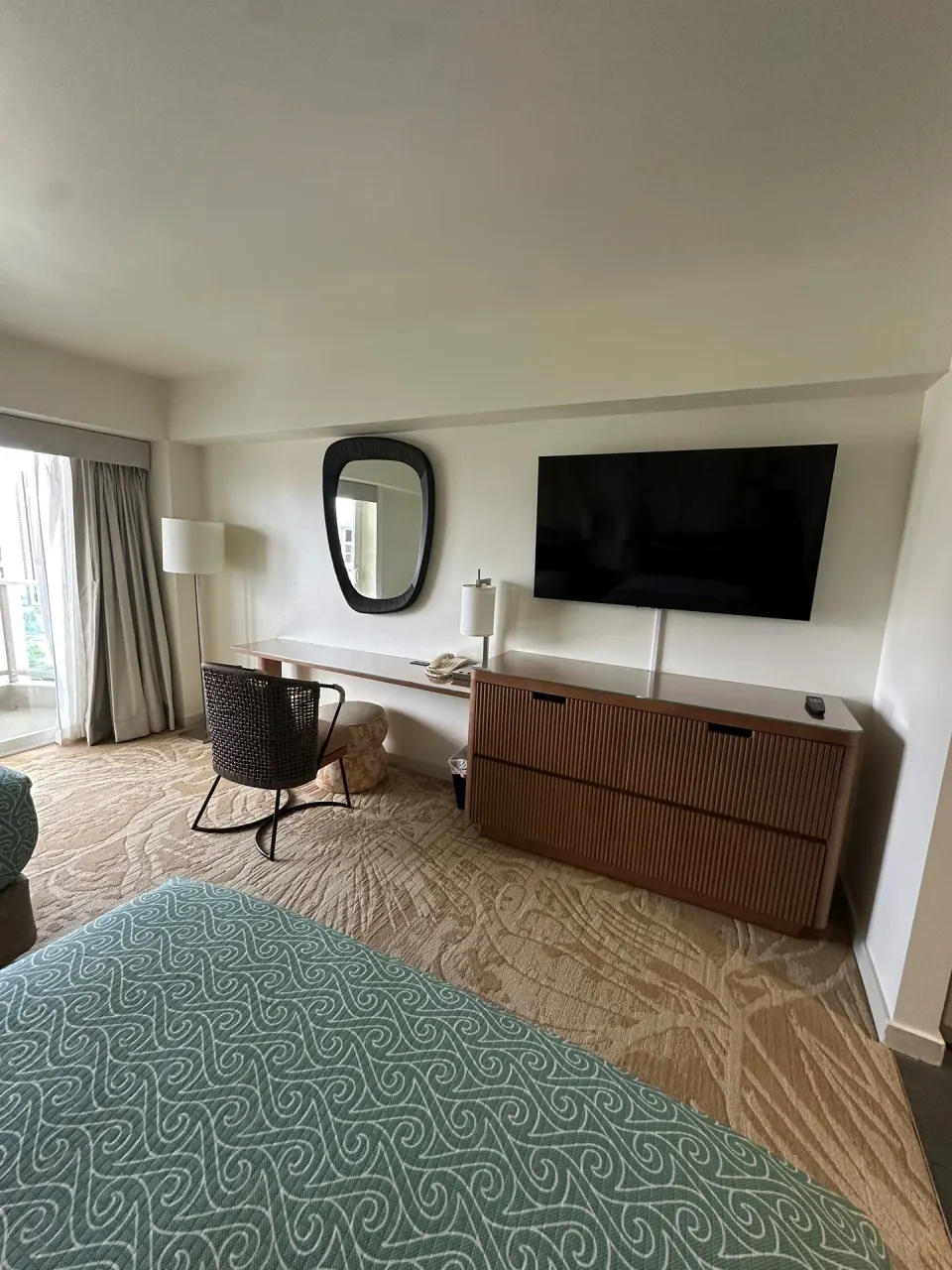 Superior Room desk, TV, and bed corner at Ala Moana Hotel.