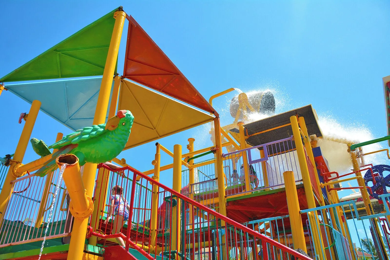 Splash structure with tipping bucket at All Ritmo Cancun Resort & Water Park.