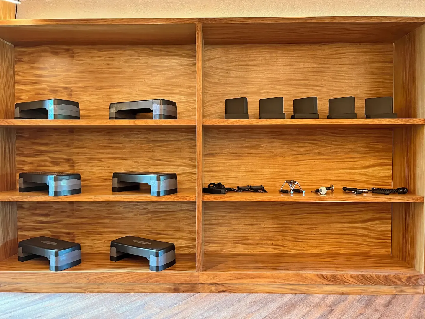 Wood fitness shelves with steps and small workout accessories at Almare, a Luxury Collection Resort, Isla Mujeres.