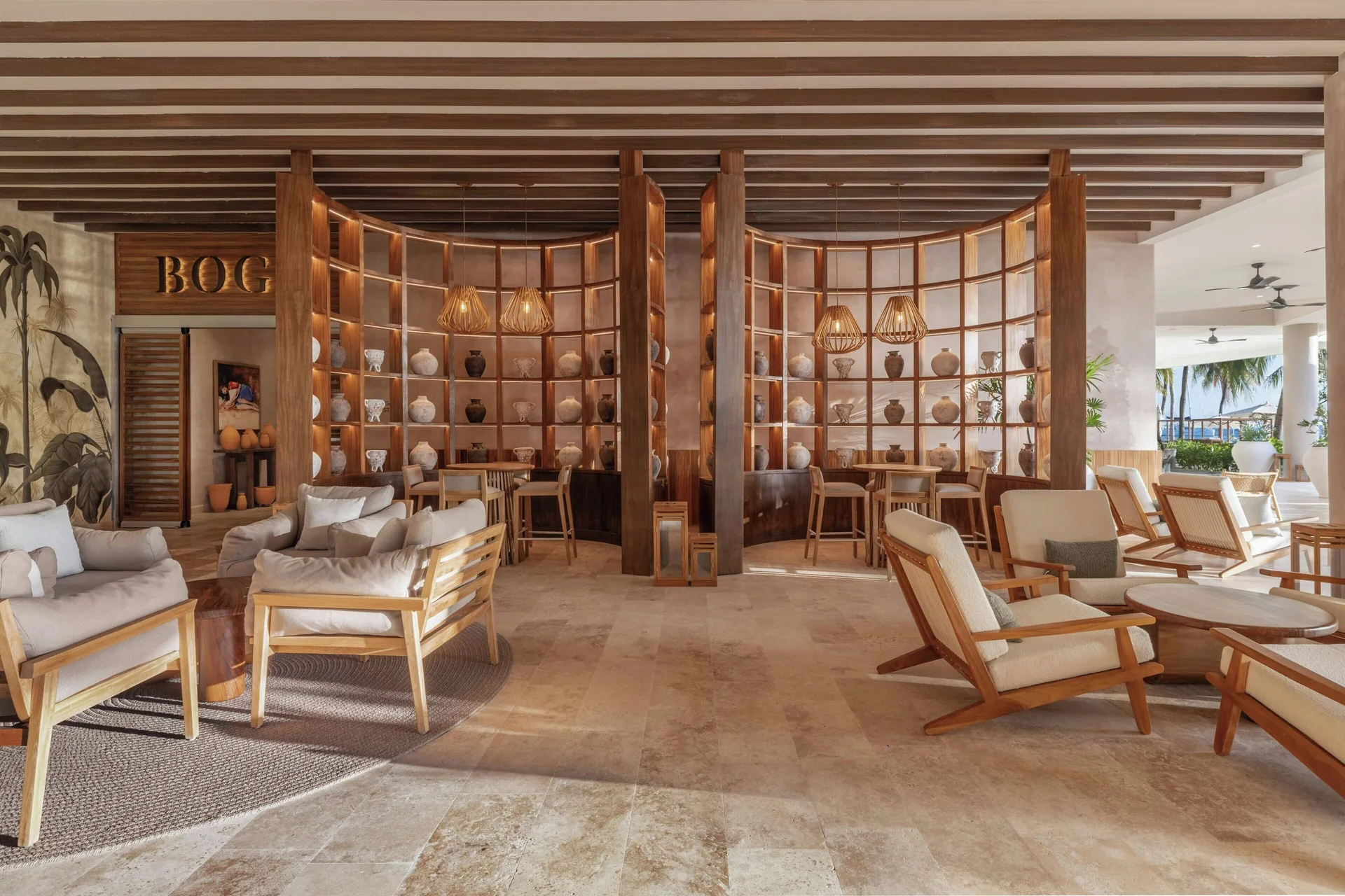 BOGA seating area with wood shelving at Almare, a Luxury Collection Resort, Isla Mujeres.