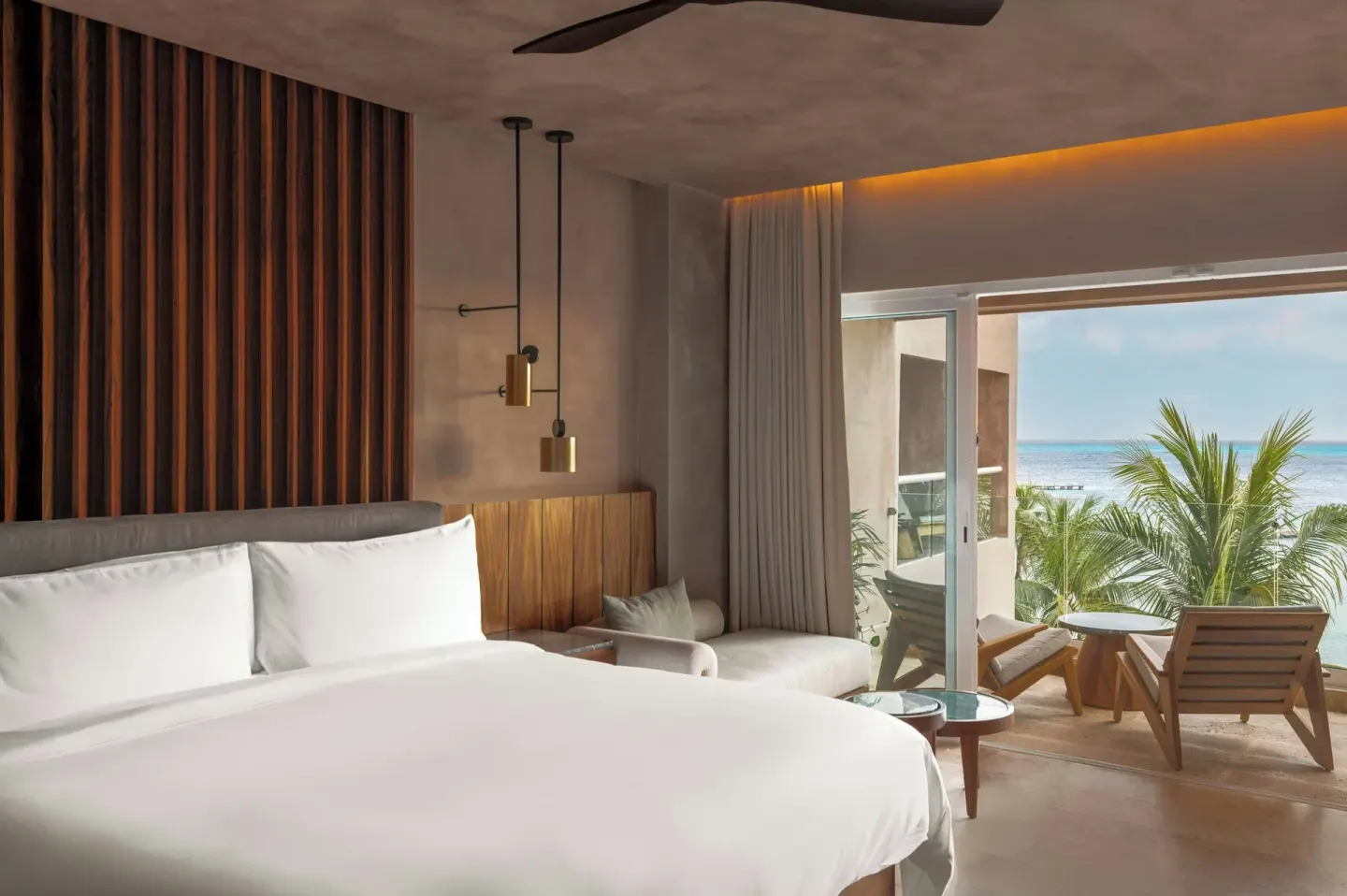 Oceanfront deluxe room with king bed and balcony at Almare, a Luxury Collection Resort, Isla Mujeres.