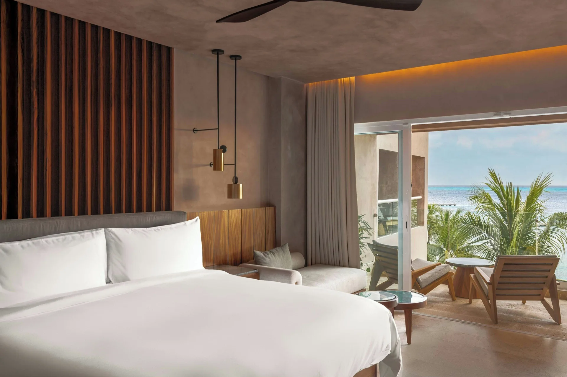Oceanfront deluxe room with king bed and balcony at Almare, a Luxury Collection Resort, Isla Mujeres.