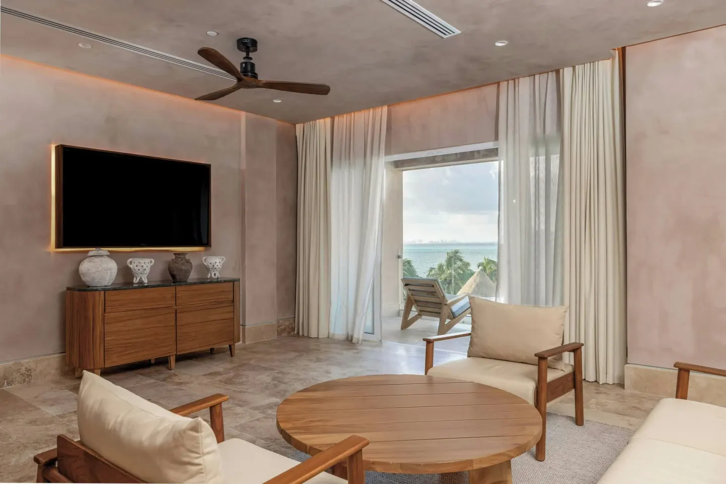 Presidential Suite living room with balcony view at Almare, a Luxury Collection Resort, Isla Mujeres.