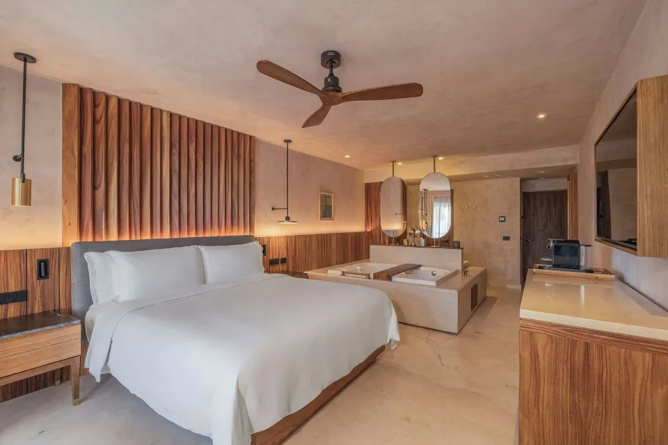 Standard Room Balcony king bed at Almare, a Luxury Collection Resort, Isla Mujeres with tub and TV console