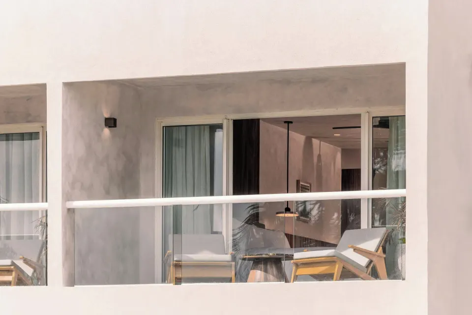 Standard Room Balcony exterior with lounge chairs at Almare, a Luxury Collection Resort, Isla Mujeres.