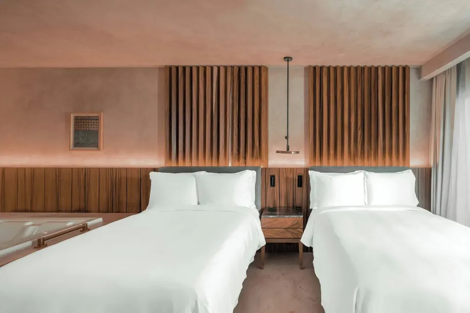 Standard Room Balcony two-bed sleeping area at Almare, a Luxury Collection Resort, Isla Mujeres.