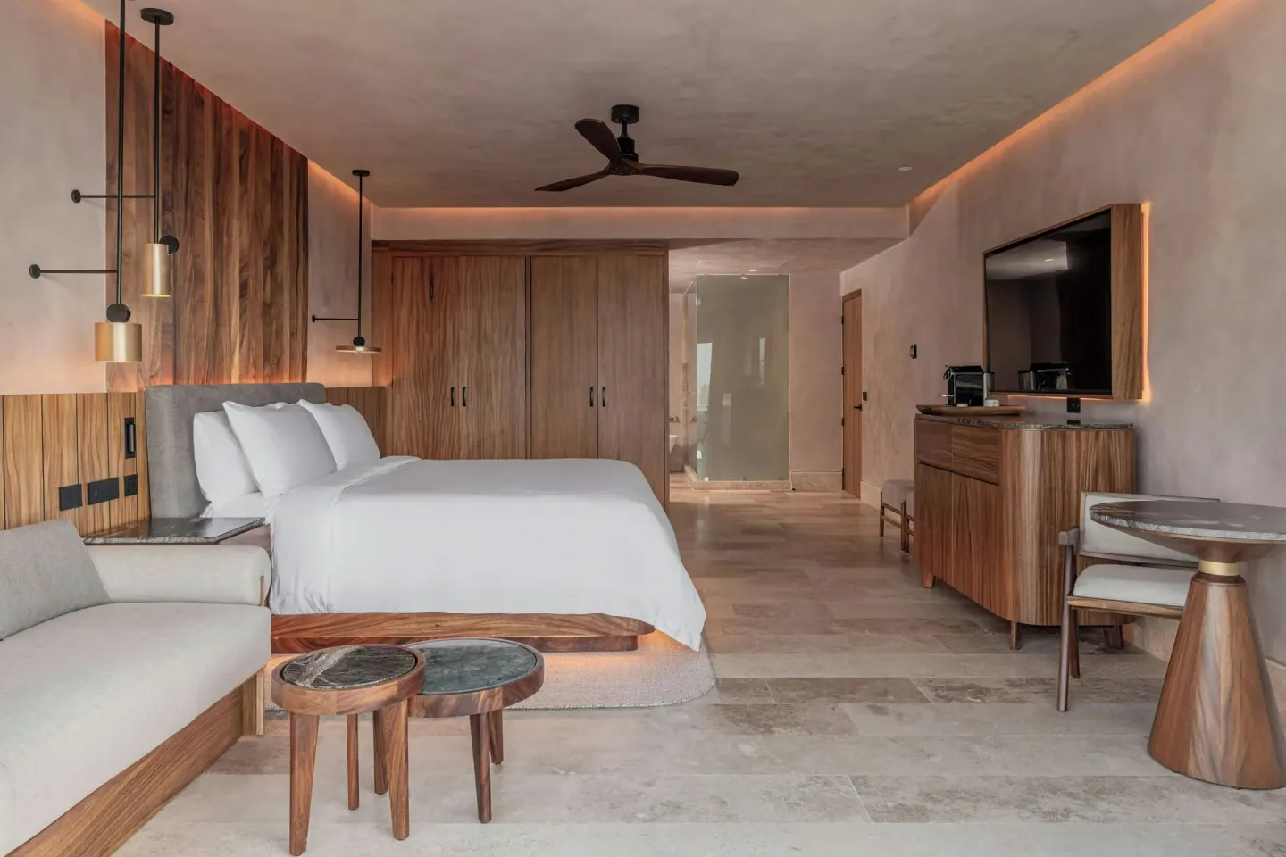 Spacious king bedroom with sitting area at Almare, a Luxury Collection Resort, Isla Mujeres.