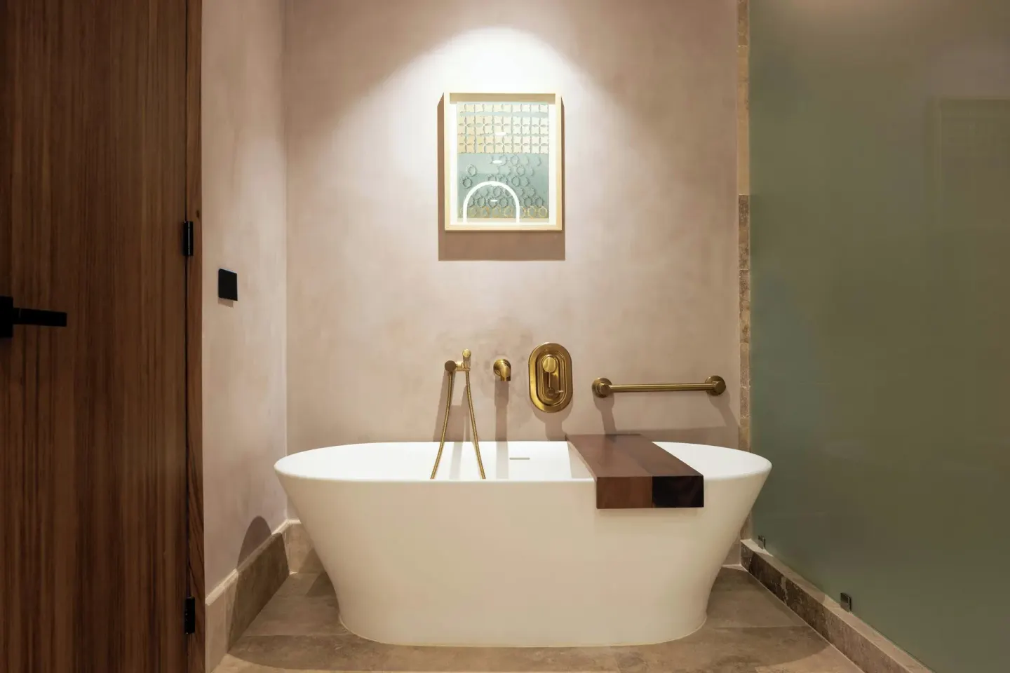 Freestanding bathtub with brass fixtures at Almare, a Luxury Collection Resort, Isla Mujeres.