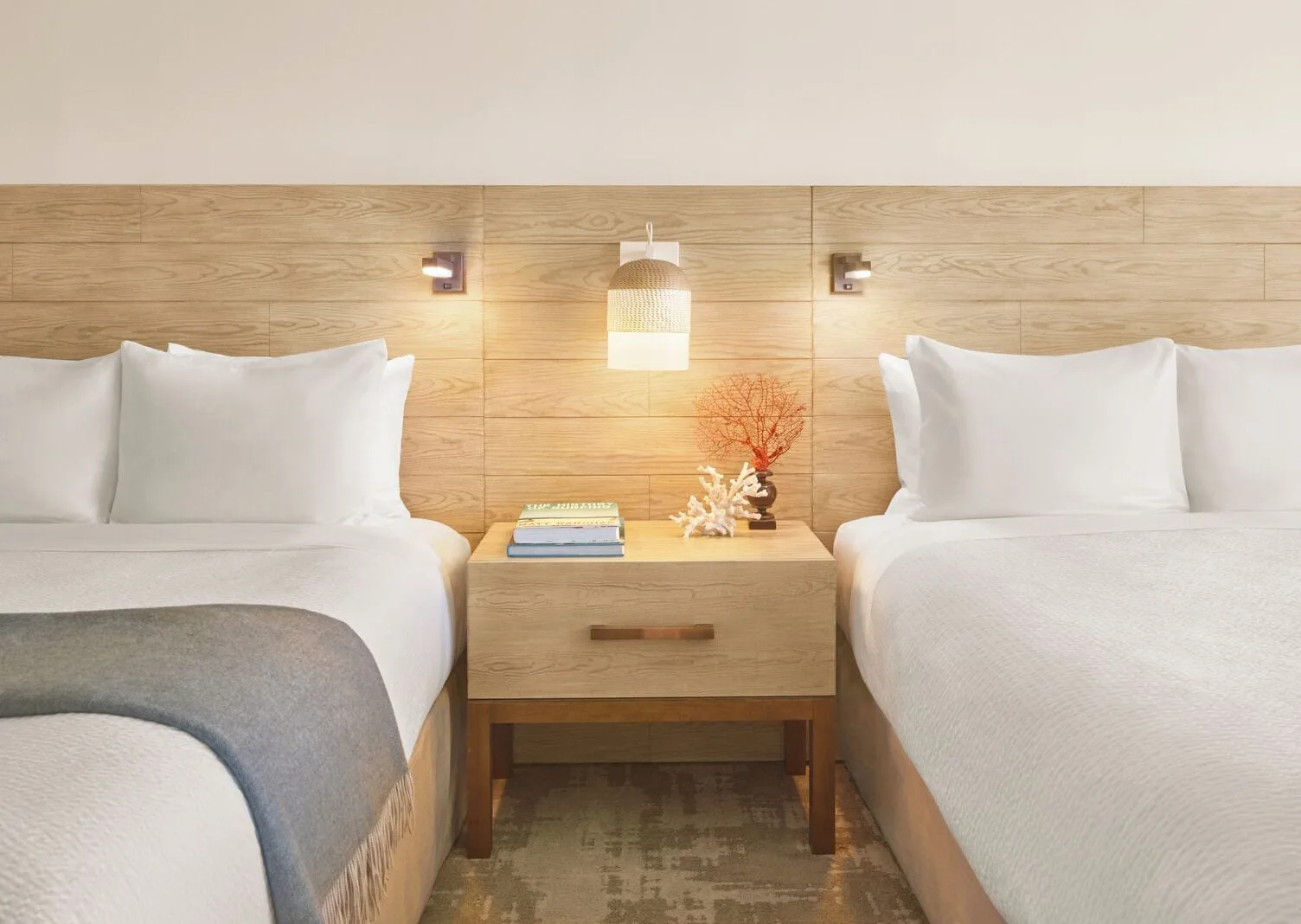 Classic Room two beds and shared nightstand at 'Alohilani Resort Waikiki Beach.
