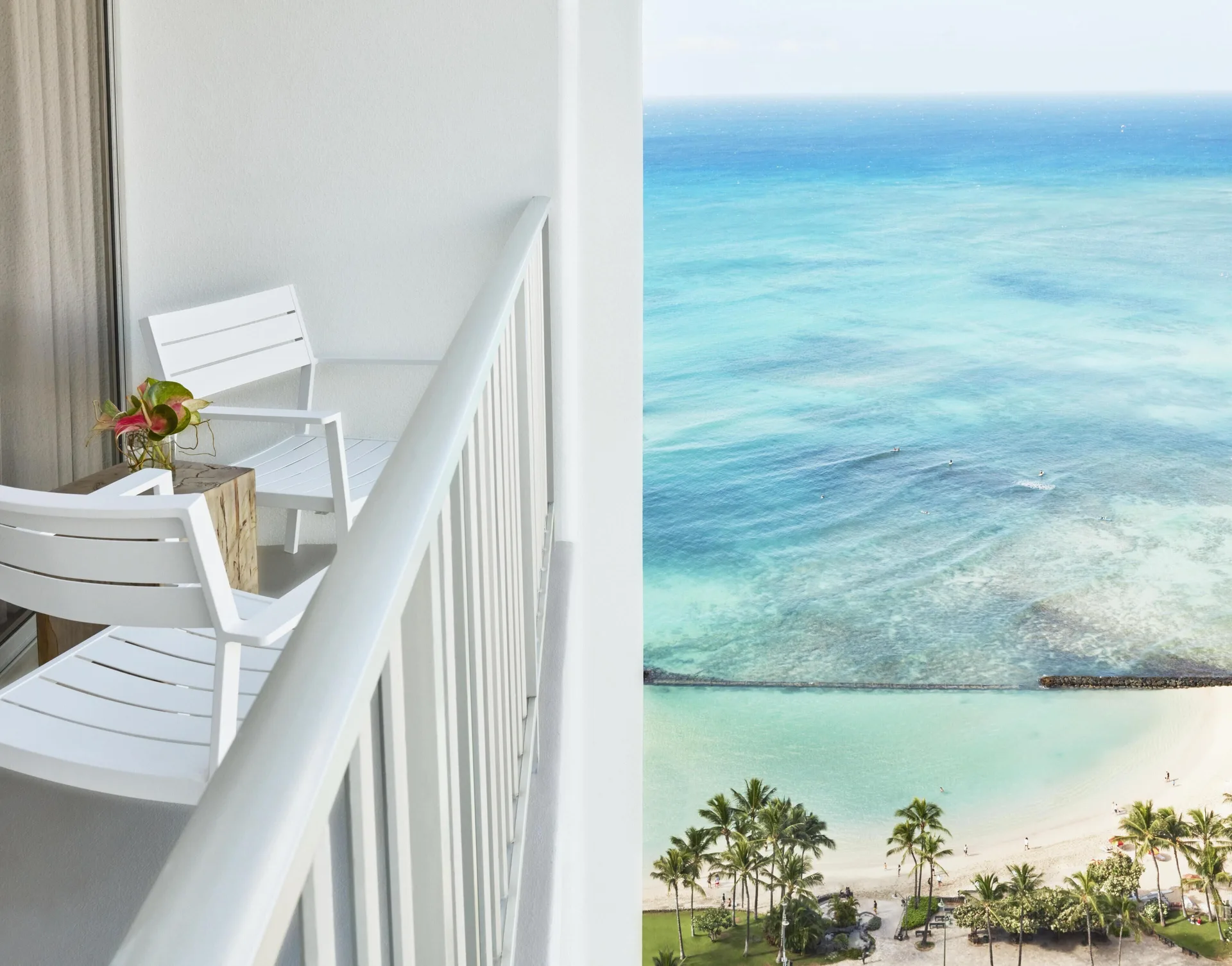 Partial Ocean View room balcony and Waikiki shoreline at 'Alohilani Resort Waikiki Beach.