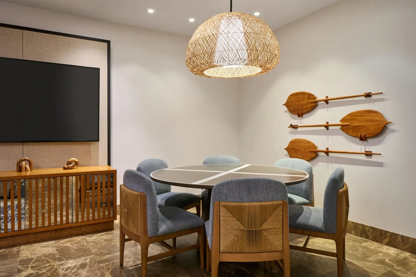 Game table room with wall-mounted paddles at Andaz Maui at Wailea Resort.