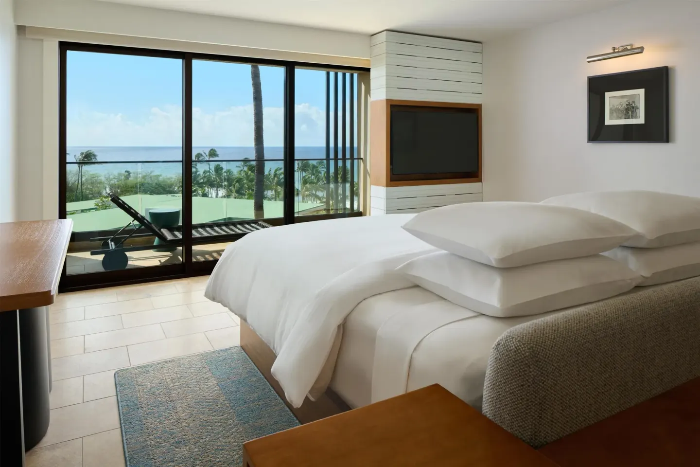 King bed guest room with balcony and ocean view at Andaz Maui at Wailea Resort.