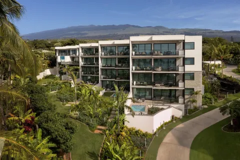 Villa building and tropical landscaping at Andaz Maui at Wailea Resort.