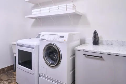 Laundry room in the 3 Bedroom Ilikai Villa at Andaz Maui at Wailea Resort.