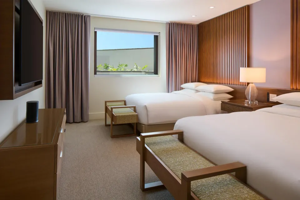 Bedroom with two queen beds in the 3 Bedroom Ilikai Villa at Andaz Maui at Wailea Resort.