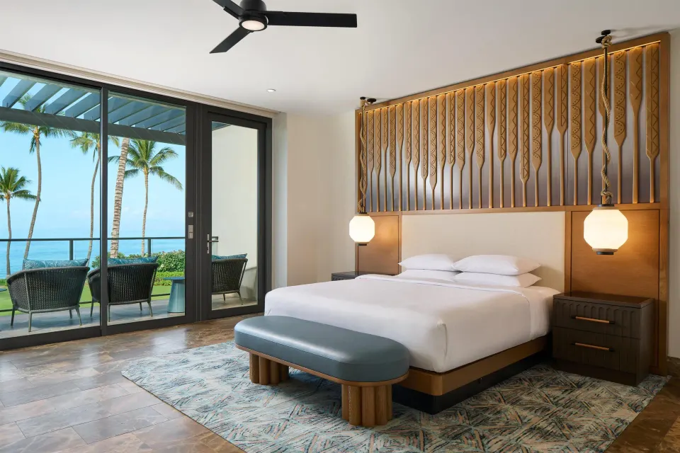 Oceanfront villa king bedroom with balcony and ocean view at Andaz Maui at Wailea Resort.