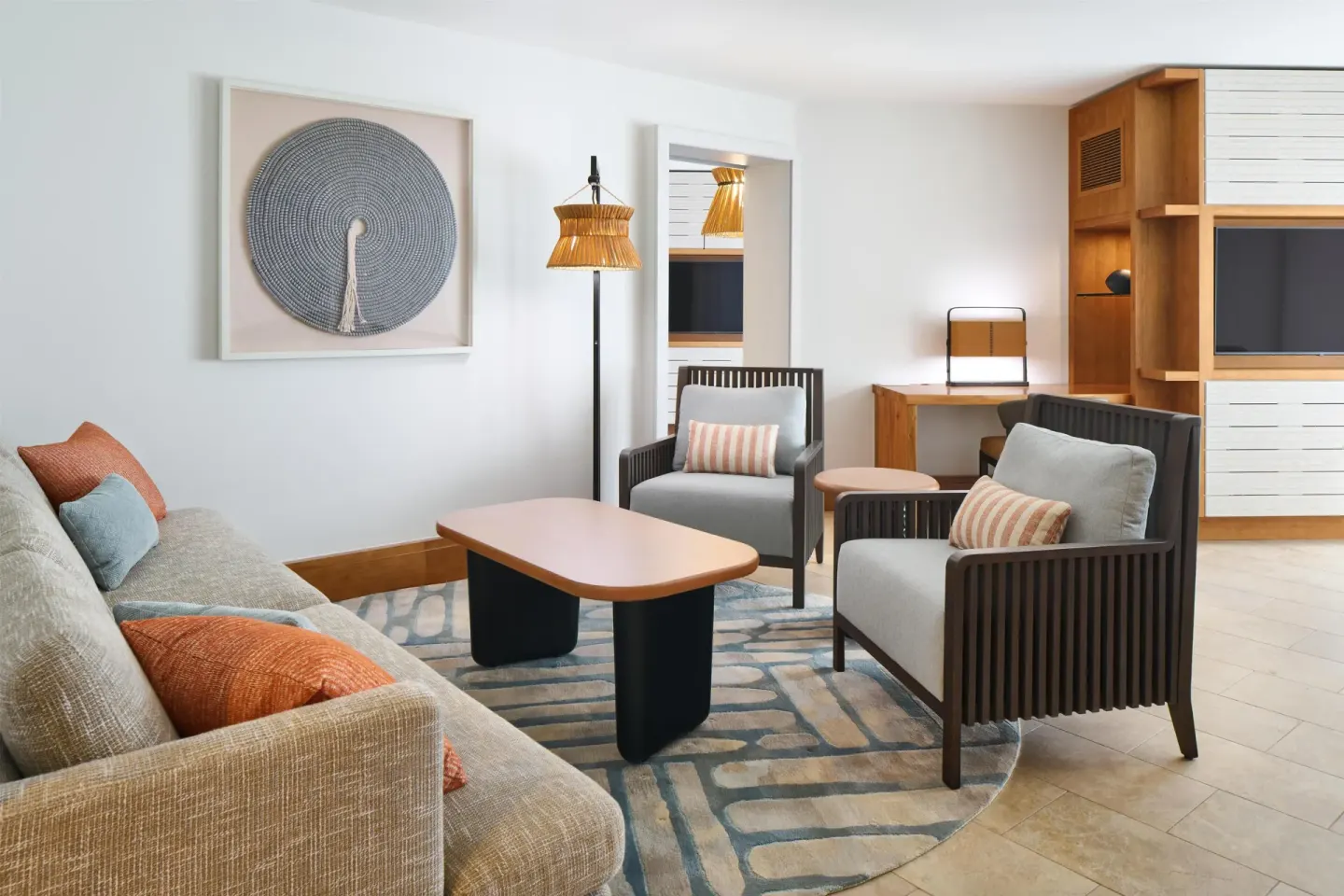 Ocean View Suite living room with sofa and armchairs at Andaz Maui at Wailea Resort.