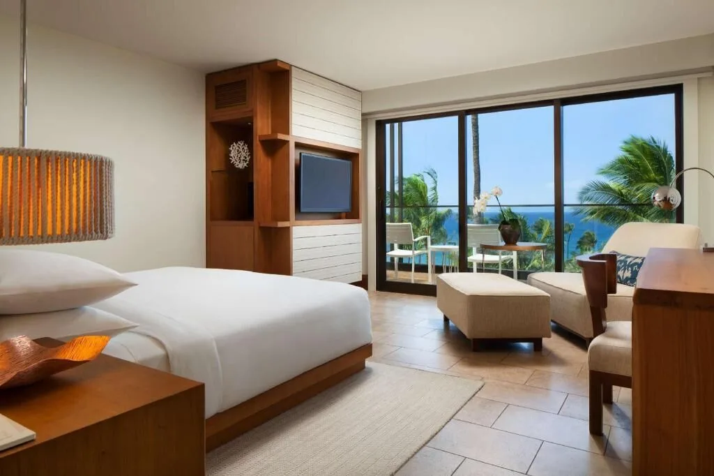 Ocean view accessible guest room with king bed and lanai at Andaz Maui at Wailea Resort.