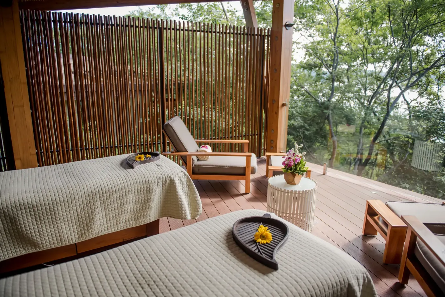 Two spa treatment beds on a screened terrace at Andaz Peninsula Papagayo Resort, Costa Rica.