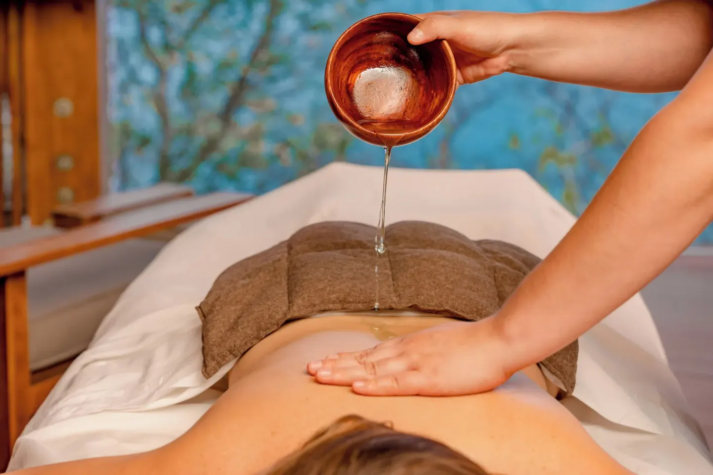 Warm oil massage treatment at Andaz Peninsula Papagayo Resort, Costa Rica.