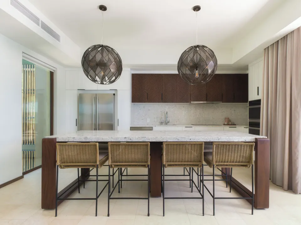 Kitchen island and bar seating in the 3 Bedroom Penthouse at Andaz Peninsula Papagayo Resort, Costa Rica.