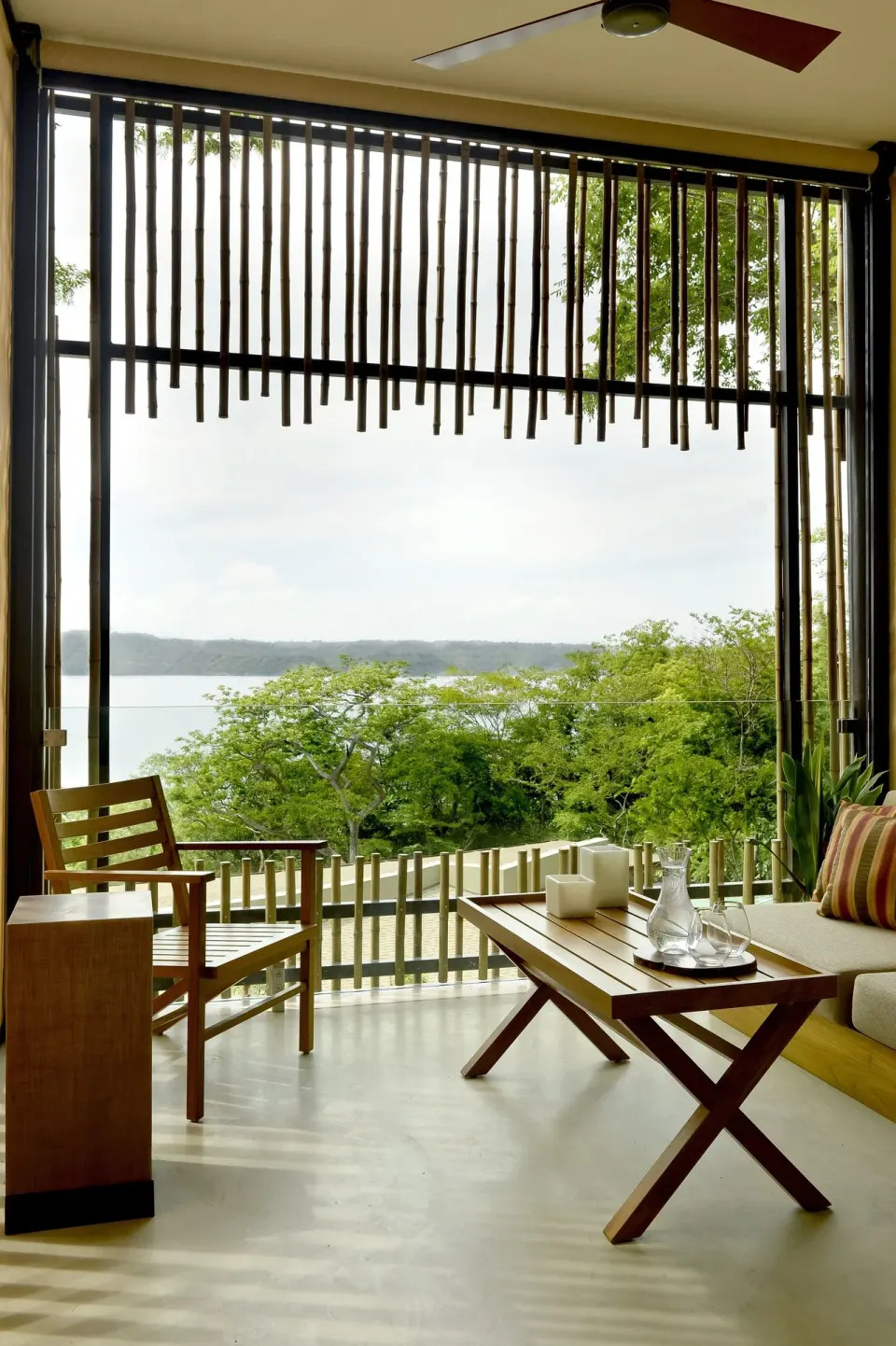 Terrace lounge with partial bay view at Andaz Peninsula Papagayo Resort, Costa Rica.