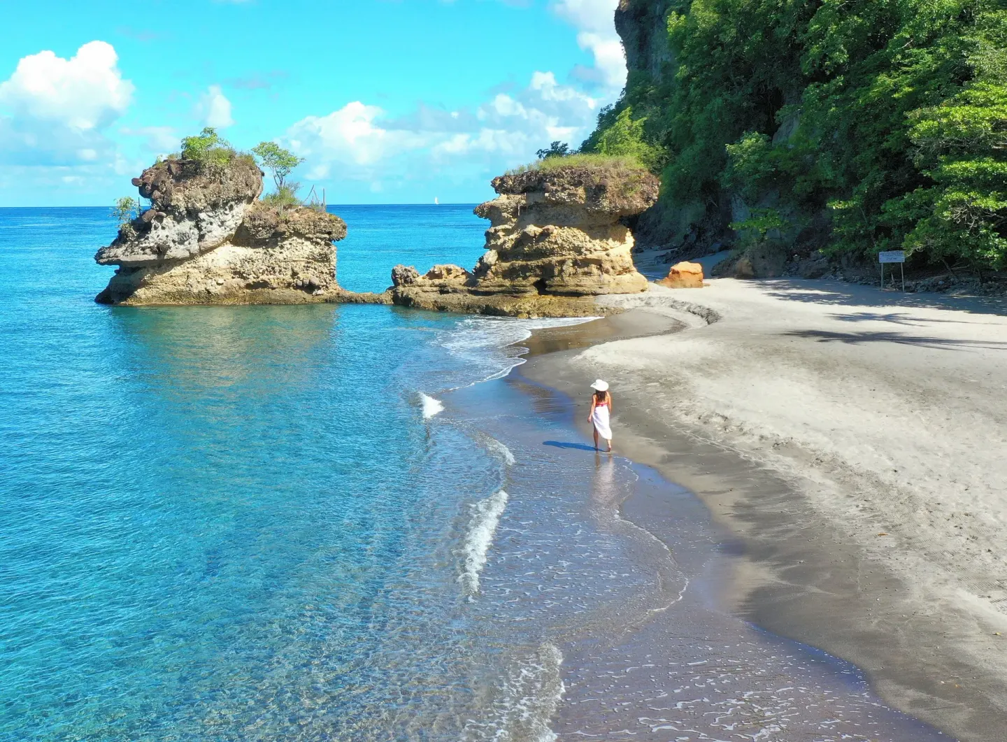 Clear water, volcanic rocks and a sandy cove at Anse Chastanet Resort.