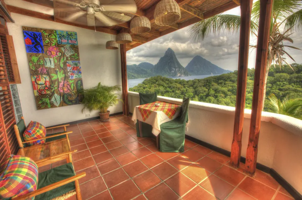 Premium Room terrace with seating and Piton views at Anse Chastanet Resort.