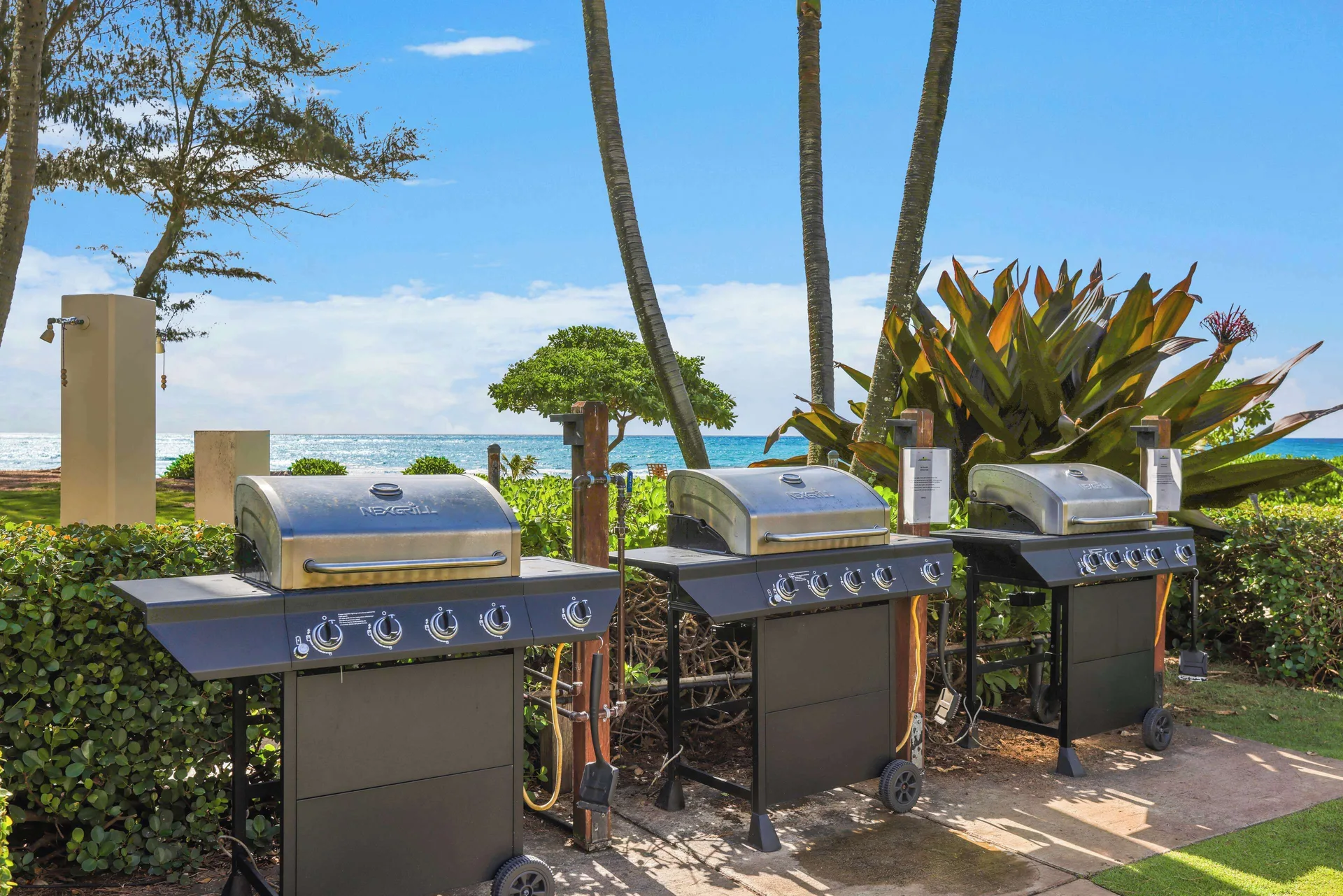Outdoor barbecue grills near the beach at Aston Islander on the Beach.