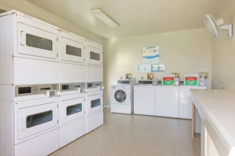 Guest laundry room with washers and dryers at Aston Islander on the Beach.