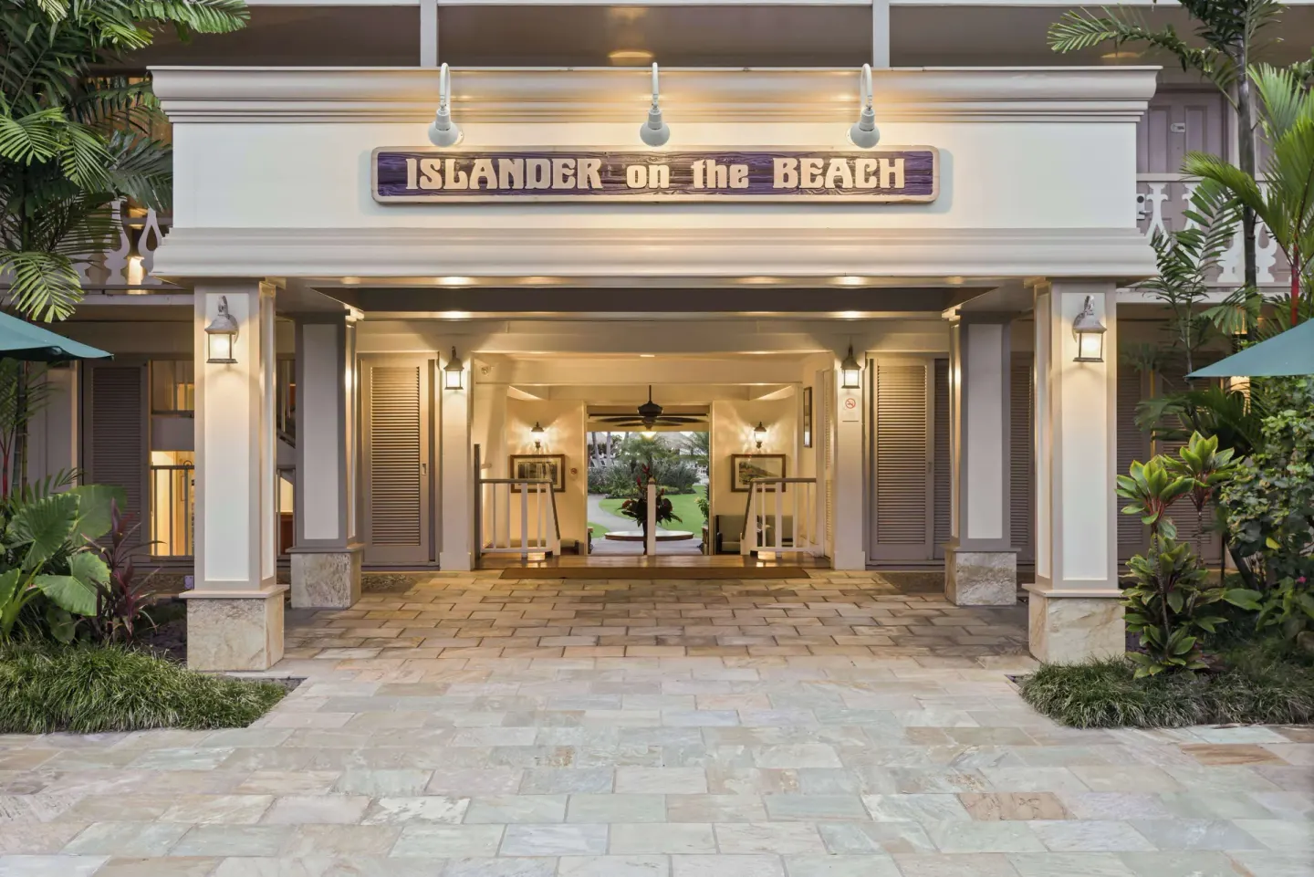 Covered entrance and sign at Aston Islander on the Beach.