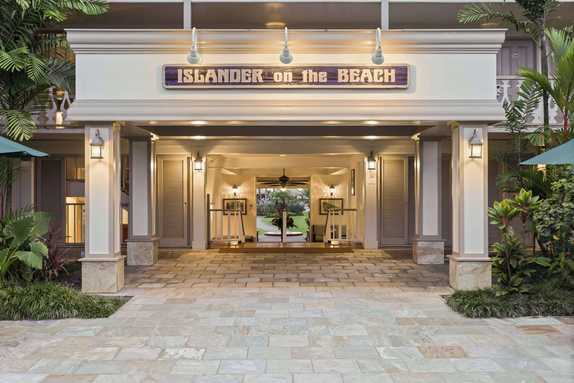 Covered entrance and sign at Aston Islander on the Beach.