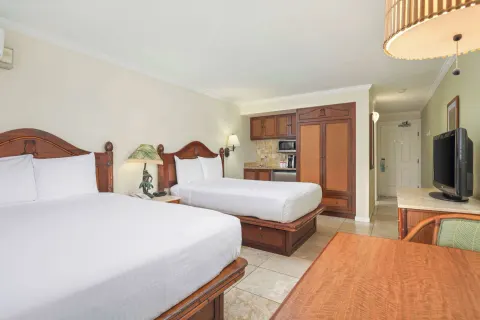 Garden View room with two beds and kitchenette at Aston Islander on the Beach.