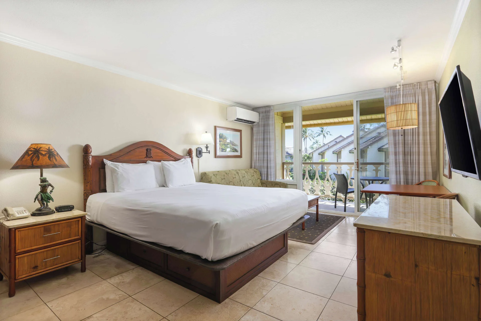Ocean View room with king bed and balcony at Aston Islander on the Beach.